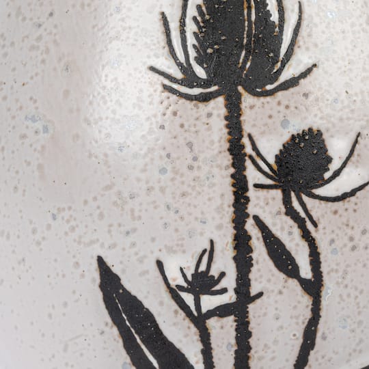 Hello Honey® 50oz. White & Black Reactive Glaze Flower Design Debossed Stoneware Pitcher
